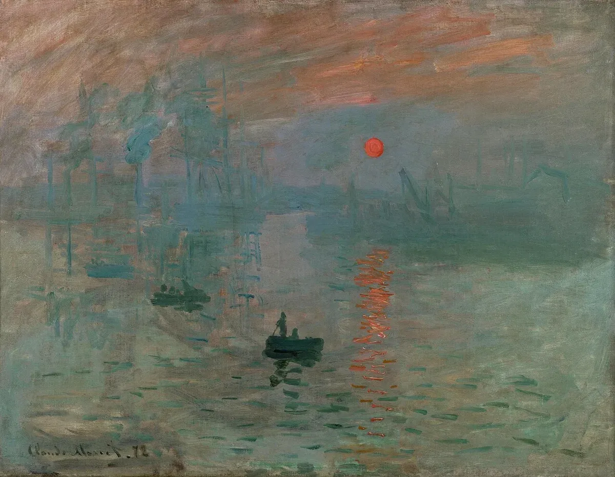 A misty harbor at dawn with an orange sun and dark rowing boats