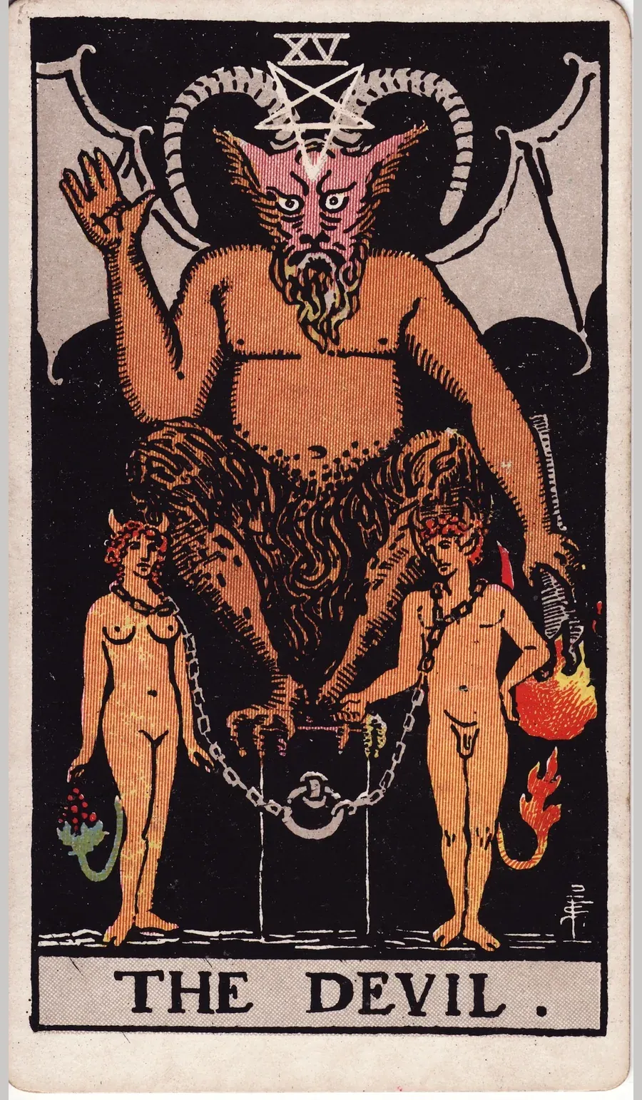 The Devil card from the 1909 Rider-Waite-Smith deck: a horned figure with bat wings sits on a dark block holding a lowered torch, while an unclothed man and woman with small horns and tails stand chained below