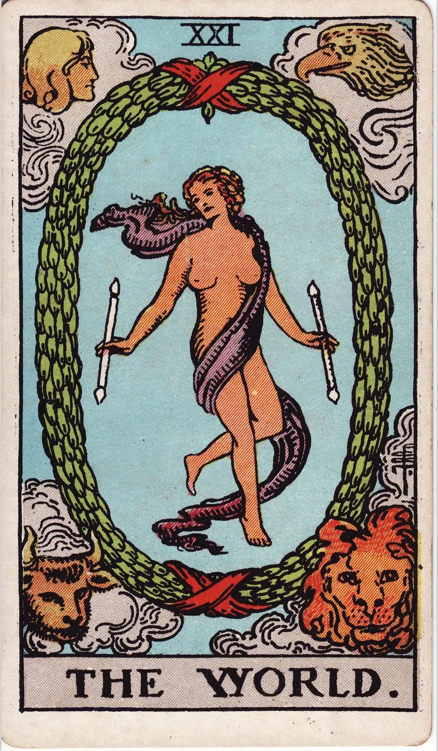 The World card from the 1909 Rider-Waite-Smith deck: a dancer wrapped in a floating scarf holds a wand in each hand inside a large oval wreath tied with red ribbons, with an angel, an eagle, a bull and a lion in the four corners