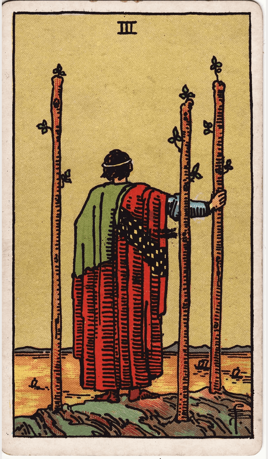 The Three of Wands from the 1909 Rider-Waite-Smith deck: a man seen from behind stands on a cliff beside three planted wands, looking out at ships sailing on a golden sea